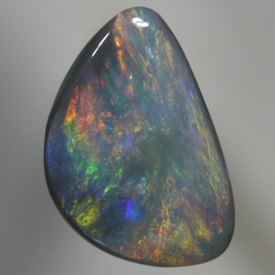 SOLID BLACK OPAL Golden fire, red, copper and green over blue purple